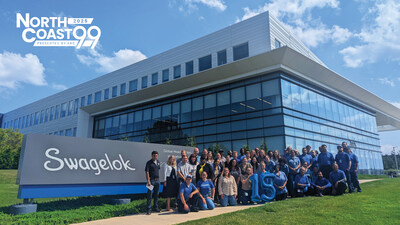 A few of Swagelok's thousands of associates stepped outside to celebrate the company's 15th NorthCoast 99 win.