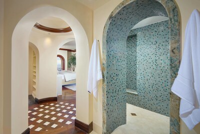 Artisanal details in primary bath and arched doorways at 3300 Ocean Blvd.