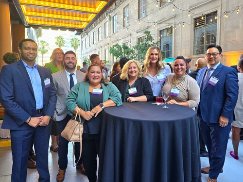 Coworkers from Roth Staffing's specialized business lines including Ultimate Staffing (administrative and customer service), Ledgent Finance & Accounting, Ledgent Technology and Adams & Martin Group (legal) get together to connect and celebrate