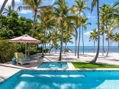 A private sanctuary at Mar-Key Islamorada, featuring a walk-in pool, hot tub, and direct access to 240 feet of pristine Atlantic beachfront.