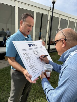 ARA CEO Tony Conant holds the Safe Tenting Standard Declaration for signing at the unveiling of the new safety and training program.