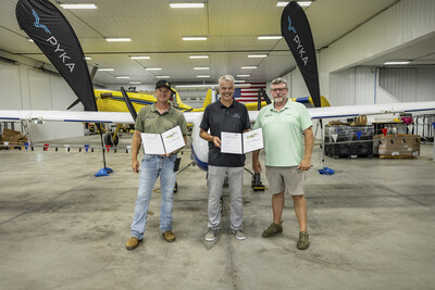 Leaders from Pyka and Heinen Brothers Agra Services