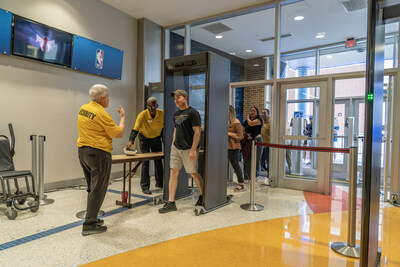 Paragon screening patrons in advance of a basketball game.