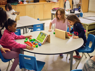 Students using Dock-n-Block kits that connect seamlessly with the Codie App.