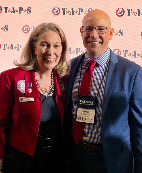 Bonnie Carroll (left) Founder & President at TAPS and Mark Szymanski (right) CEO at Evocati PR pose for a photo together at the 2025 TAPS Good Grief Camp .