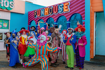 A Colorful Troupe of Clowns Pose and Play at the all-new Funhouse at Pacific Par