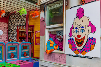 Sprinkles The Clown Looking Out From a Window Inside the Ice Cream Truck at the all-new Funhouse at Pacific Park