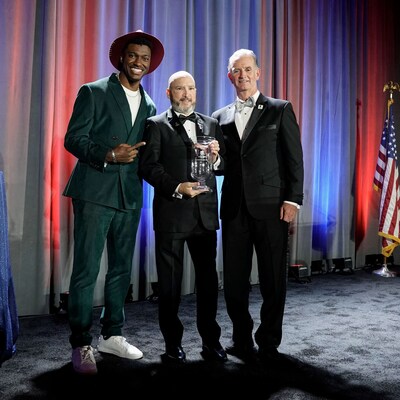 Former Pro Bowl quarterback Robert Griffin III (left), Courage Award honoree Deron Santiny (center), and WWP CEO Lt. Gen. (Ret.) Walt Piatt (right) pose for a photo at the annual Courage Awards & Benefit Dinner on Sept. 10, 2025, in Washington, DC. Former Pro Bowl quarterback Robert Griffin III (left), Courage Award honoree Deron Santiny (center), and WWP CEO Lt. Gen. (Ret.) Walt Piatt (right) pose for a photo at the annual Courage Awards & Benefit Dinner on Sept. 10, 2025, in Washington, DC.