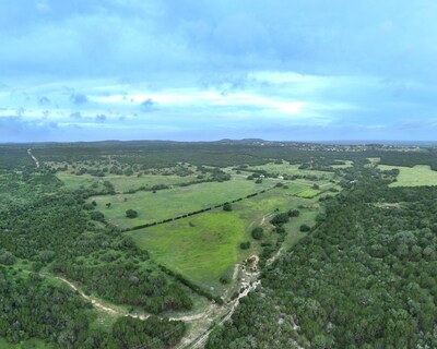 Otra Vez Ranch near Austin, Texas, in the state’s legendary Hill Country, is an exceptional private retreat that offers 434+/- acres, dramatic views, spring-fed grottos, abundant wildlife, swimming holes, a handsome home, guest casitas, an equestrian barn and a riding arena. In an area of both revered tradition and exciting transition, it is represented by the TT Ranch Group of Briggs Freeman Sotheby’s International Realty for $11,000,000.
