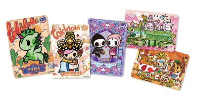 The tokidoki Wonder Voyage Collectible Cards — Roaming Edition takes collectors on an "Adventure Journey" with Brush Rare (BP) cards that form a four-season panorama and Extreme Rare (XR) cards featuring theatrical duos, all accented with holographic elements and gold stamping.