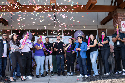 Comcast employees celebrate grand opening of new Lawrenceville location.