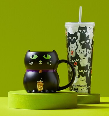 Tim Hortons launches NEW spooktacular Halloween merch including Black Cat heat-activated mug, glow-in-the-dark tumbler, and Timbits Bucket! (CNW Group/Tim Hortons)