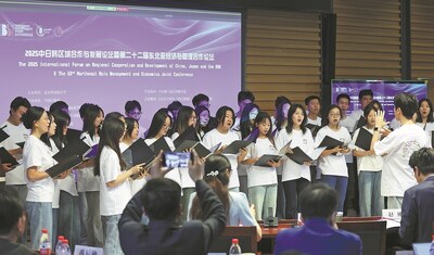 Beijing Foreign Studies University Choir performs the Chinese folk song "Jasmine Flower" at the opening of the 2025 International Forum on Regional Cooperation and Development of China, Japan and the ROK on Friday in Beijing. WANG ZHUANGFEI/CHINA DAILY