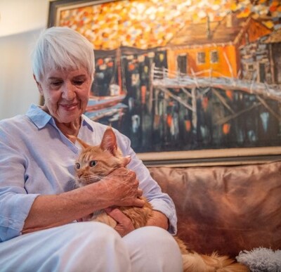 Sharon joyfully reunited with her cat, Louie.