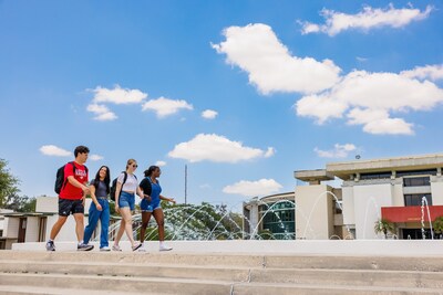 Florida Southern College students enjoying the iconic Water Dome.