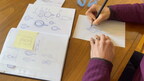 Inventor Carly Price sketching the product.