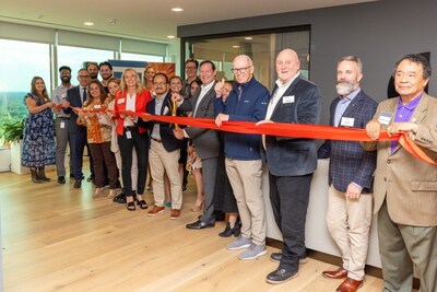 Gresham Smith's Detroit office leaders and employees celebrate their open house with an official ribbon cutting.