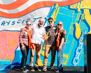 American Crane Dedicates New Mural with Colorful Ribbon-Cutting Celebration