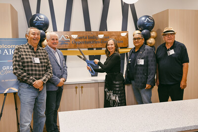 Hank Shade, Ward Sutherland, Chana Martineau, Stephen Buffalo and Jim Boucher participate in a ribbon cutting for the Alberta Indigenous Opportunities Corporation's new office on Tsuut'ina First Nation on Treaty 7. Tuesday, Sept. 23, 2025 (CNW Group/The Alberta Indigenous Opportunities Corporation)