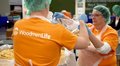 WoodmenLife volunteering at a food bank.
