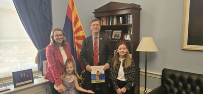 Kendra Riley and two of her daughters, Keira and Eva, with Rep. Greg Stanton in Washington D.C.