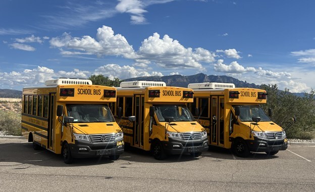 Three GreenPower Nano BEAST school buses staged in Rio Rancho, New Mexico.