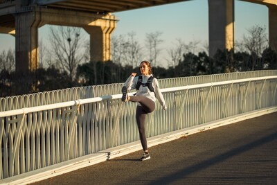 A lady uses the Zelus Weighted Vest