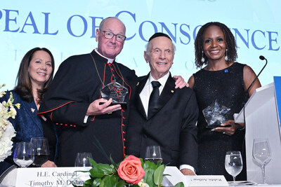 Recipients of the 2025 Appeal of Conscience Award, Cardinal Timothy Dolan, the Archbishop of New York, and Dr. Awele Elumelu, accepting on behalf of her husband, Tony Elumelu, Chairman of Heirs Holdings and United Bank for Africa, are joined at the 60th Annual Appeal of Conscience Awards by Karen Dresbach, Executive Vice President of the Appeal of Conscience Foundation, and Rabbi Arthur Schneier, founder and president of the Appeal of Conscience Foundation. (Diane Bondareff/AP Content Services for The Appeal of Conscience Foundation)