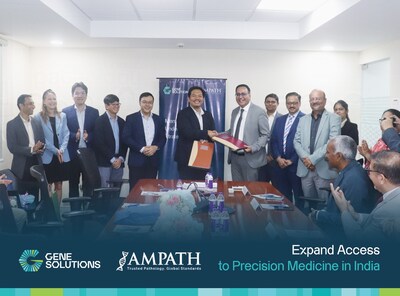 Dr. Nguyen Hoai Nghia, Co-founder and CEO of Gene Solutions (sixth from left), and Dr. Maneesh Bagai, COO of AMPATH (standing to his right), exchange the signed Memorandum of Understanding (MOU).