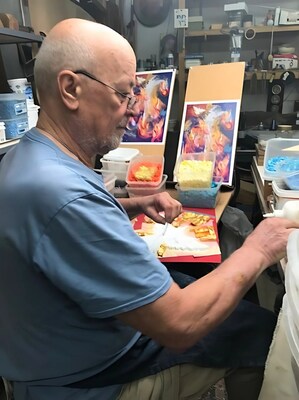 In his Los Angeles studio, Alexander Mandradjiev carefully selects each delicate piece of stone and glass that will come together to form a finished mosaic masterpiece.