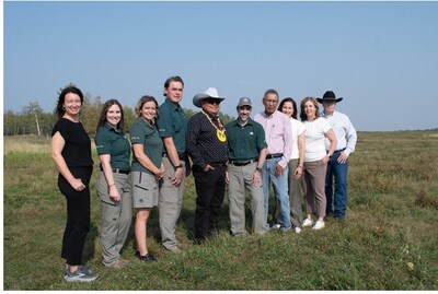 Representatives for the Manitou Asinîy - Iniskim - Tsa Xani (MAITX) Centre and the Government of Canada pose together in the grasslands that support the bison herds that roam in Elk Island National Park.

From left to right: Stephanie Strong (Canadian Heritage), Cassandra Paccanaro (Parks Canada), Sharon Hayes (Parks Canada), Dale Kirkland (Parks Canada), Leonard Weasel Traveller (MAITX), the Honourable Minister Steven Guilbeault, Lenoard StandingontheRoad (MAITX), Jennifer Lavier Jankovic (MAITX), Chantal Alarie (Canadian Heritage), Grant Sprague (MAITX). (CNW Group/Parks Canada (HQ))