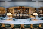 The transformed bar and lounge offer an inviting setting for dining, cocktails, and connection in the heart of the atrium.