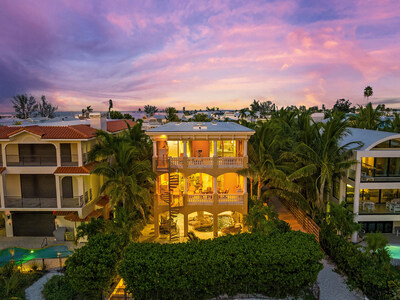 The direct oceanfront estate features three living levels, in addition to an entry-level courtyard with custom pool, cabana bath and lounge, plus two, spacious oceanfront terraces. OceanfrontLuxuryAuction.com.