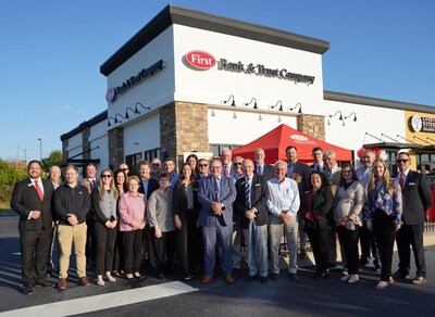 First Bank and Trust Company Board of Directors and employees pose for a photo following the Business After Hours event on October 2nd.