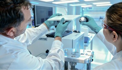 Glice scientists examining the latest prototype