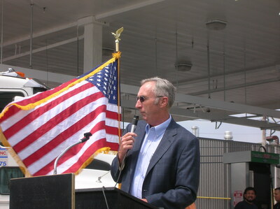 Ed Burke speaking at the opening of E-85 retail pump at the Burke Biofuels Center, Chelsea MA, in 2008 (PRNewsfoto/Dennis K. Burke Inc.)