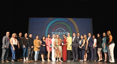 Volunteers and featured clients at the 2025 Prospera Success Stories in South Florida