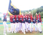 The Shincheonji Church baseball team cheers while holding the trophy after winning the 2nd Division game at the same tournament on the 28th at Hoengseong Baseball Park.