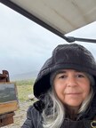 Artist Christine Apostolina Beirne painting at Galbraith Lake, Alaska. Above the Arctic Circle