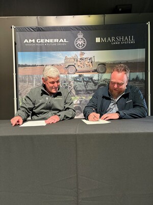 (From left to right) John Chadbourne, AM General Executive Vice President and Carl Forey, Marshall Land Systems Chief Revenue Officer, sign Memorandum of Understanding to collaborate on the upcoming United Kingdom Ministry of Defence Land Mobility Programme.