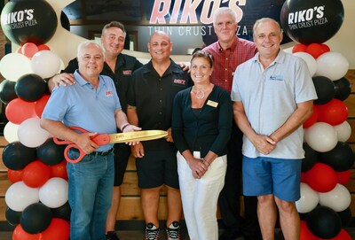 PHOTO (left to right): Rico Imbrogno, Founder and CEO of Riko’s Pizza; John Greco and Mark Suda, Riko’s Pizza of Carolina Beach Franchisees; Jackie Wikander, Director of Marketing at the Pleasure Island Chamber of Commerce; Carolina Beach Mayor Lynn Barbee; and Jim DeGilio, Pleasure Island Chamber of Commerce Executive Director.