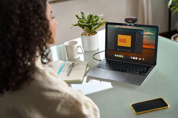 SunBooster attached to laptop screen and delivering a targeted dose of near-infrared light over a three to four hour period while you work, study, game or browse online.