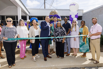 Comcast unveil two new peanut sculptures outside the Oates Street Xfinity Store in Dothan, AL on Wednesday, Oct. 8, 2025. These new peanut sculptures join more than 100 others as part of Dothan's iconic 