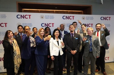 Cheers to 90 years! USSFCU staff celebrate the credit union’s milestone anniversary together.