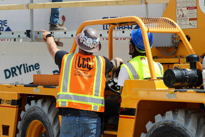 Operator guides student at Oakland School Technical Campus BYF