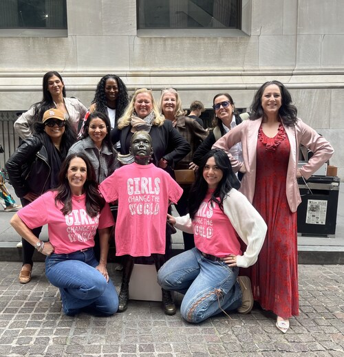 Girls Rule Foundation and supportive women at Fearless Girl Statue.