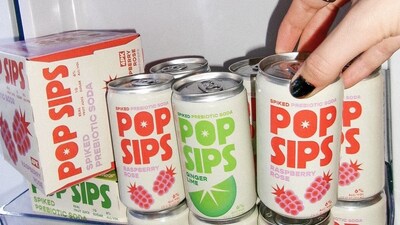 PopSips spiked prebiotic sodas stocked in the fridge, category defining product packaging, that gives strong brand identity.