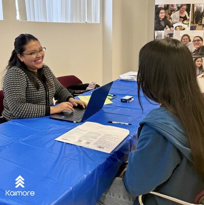 Kaimore's Certified Tax Preparer Marga Lopez completes taxes for a client and explains the refund process while providing financial literacy education, all free of cost to the client.