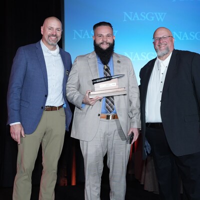 NASGW Chairman Bill Sumner (left) and POMA Executive Director Rob Sexton (right) present the Best New Rifle Caliber Award to Henry Repeating Arms’ Nicholas DeAngelo for the SPD HUSH Series. (Photo: NASGW) NASGW Chairman Bill Sumner (left) and POMA Executive Director Rob Sexton (right) present the Best New Rifle Caliber Award to Henry Repeating Arms’ Nicholas DeAngelo for the SPD HUSH Series. (Photo: NASGW)