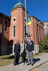 Mary Gallery, Christina Smith and Colin Robinson - in front of RMR Armoury - lamp post banner above